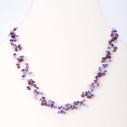 glass bead choker necklace in lilac tones and darker feature.